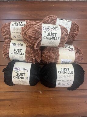 Premier Just Chenille Plush Yarn Bundle in Black (2) and Brown (5).
